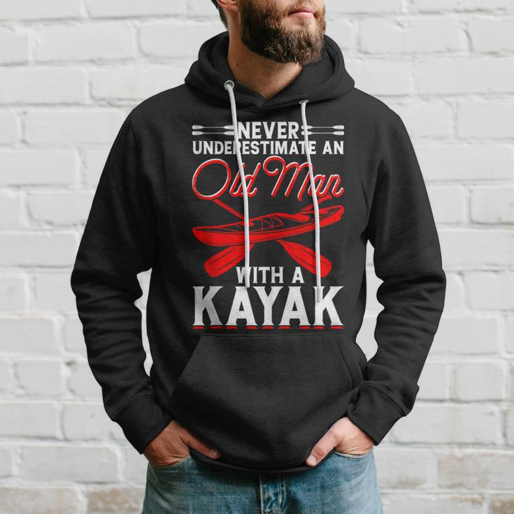 Never Underestimate An Old Man With A Kayak Kayaking Hoodie Gifts for Him