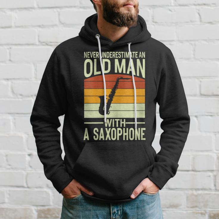 Never Underestimate An Old Man With A Saxophone Musician Hoodie Gifts for Him
