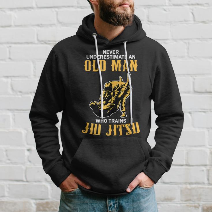 Never Underestimate An Old Man Training Brazilian Jiu Jitsu Hoodie Gifts for Him