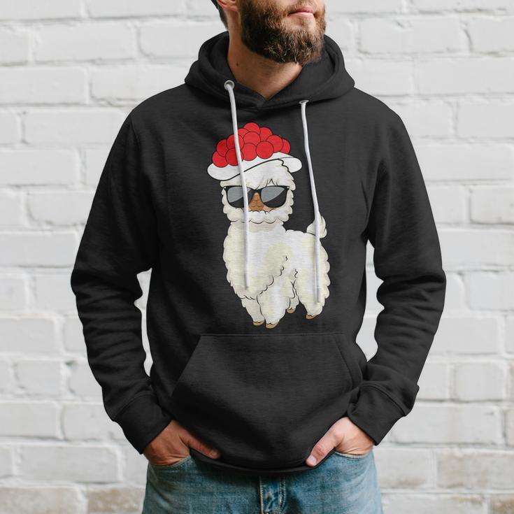 Weihnachtslama Unisex Hoodie mit Sonnenbrille & Weihnachtsmütze Geschenke für Ihn