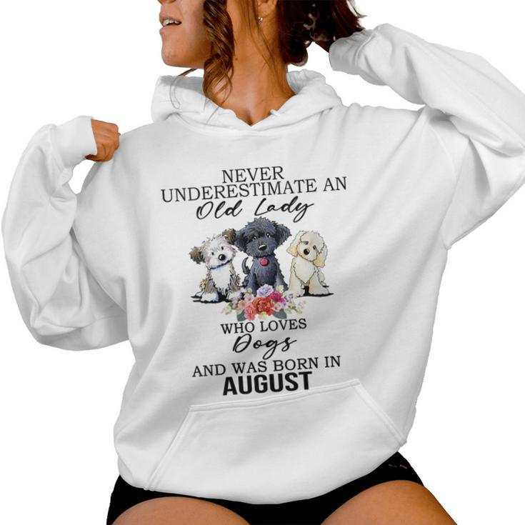 Never Underestimate An Old Lady Who Loves Dogs- August Women Hoodie