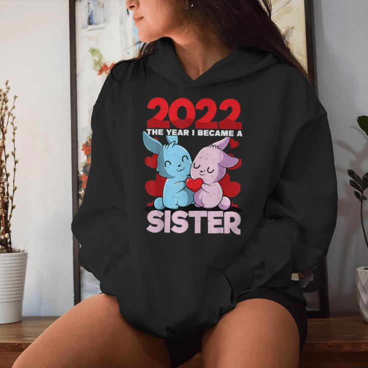 Becoming A Sister 2022 Bunny Baby Sibling Announcement Women Hoodie Gifts for Her