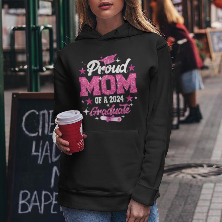 Proud Mom Of A 2024 Graduate Pink Senior Graduation 24 Women Hoodie Unique Gifts