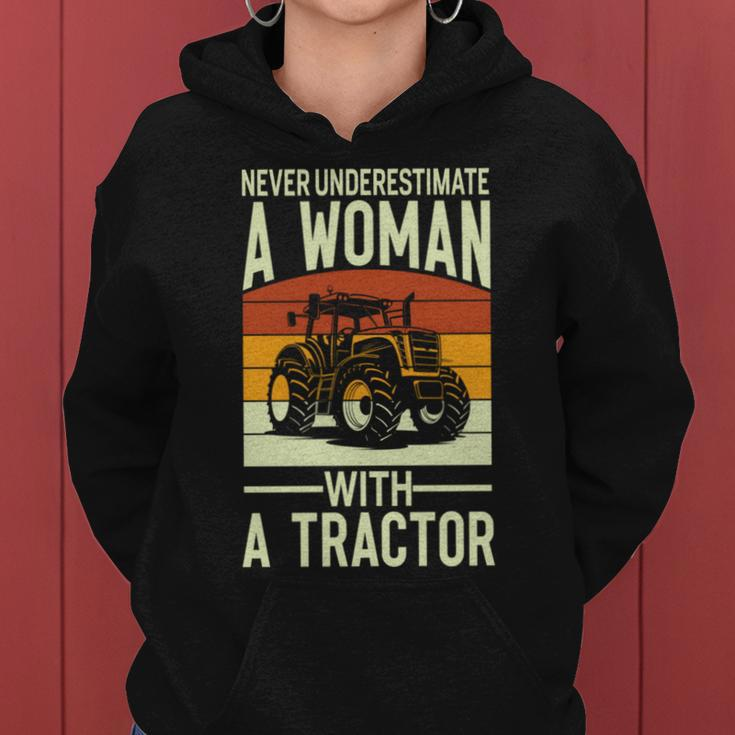 Never Underestimate A Woman With A Tractor Farmer Women Hoodie