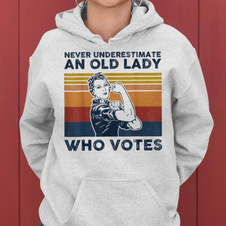 Never Underestimate An Old Lady Who Votes Feminist Women Hoodie