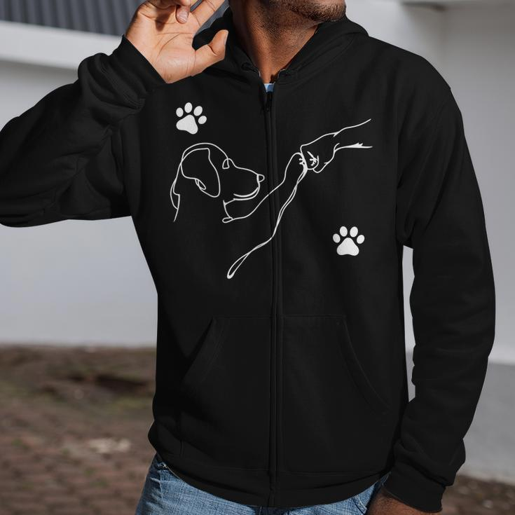Dog And People Punch Hand Dog Friendship Fist Bump Dog's Paw Zip Up Hoodie