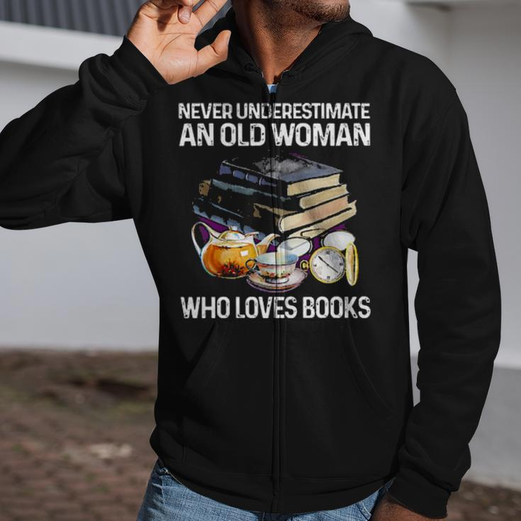 Never Underestimate An Old Woman Who Loves Books Zip Up Hoodie