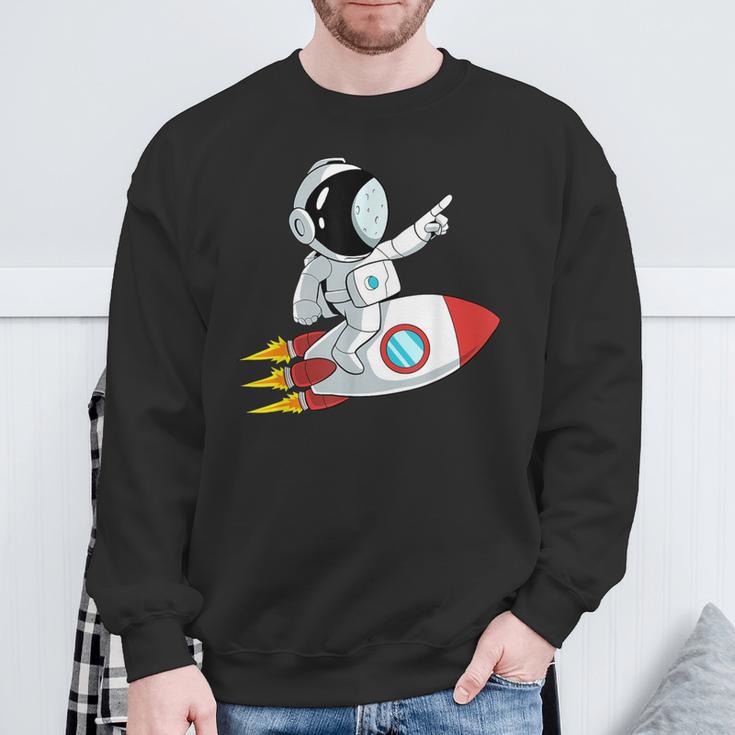 Astronaut und Rakete im Weltraum Sweatshirt, Unisex Schwarz Geschenke für alte Männer