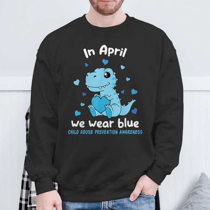 Dino In April We Wear Blue Child Abuse Prevention Awareness Sweatshirt Gifts for Old Men