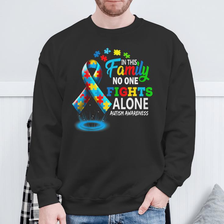 In This Family Nobody Fights Alone Blue Autism Awareness Sweatshirt Gifts for Old Men