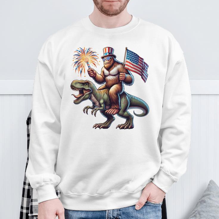 Bigfoot Sasquatch Riding DinosaurRex 4Th Of July Sweatshirt Gifts for Old Men