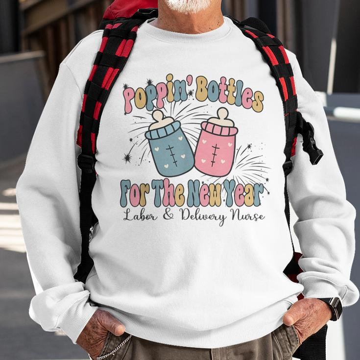 Poppin' Bottles For The New Year 2024 Labor And Delivery Sweatshirt Gifts for Old Men