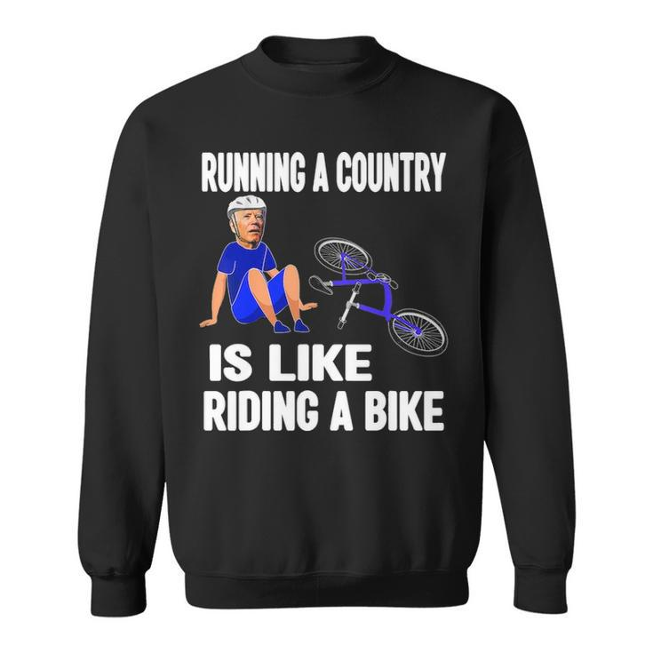 Biden Falls Off Bike Joe Biden Falling Off His Bicycle Sweatshirt