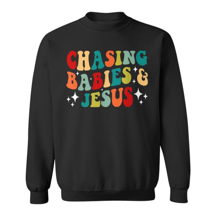 Chasing Babies And Jesus Chasing Babies & Jesus Christian Sweatshirt