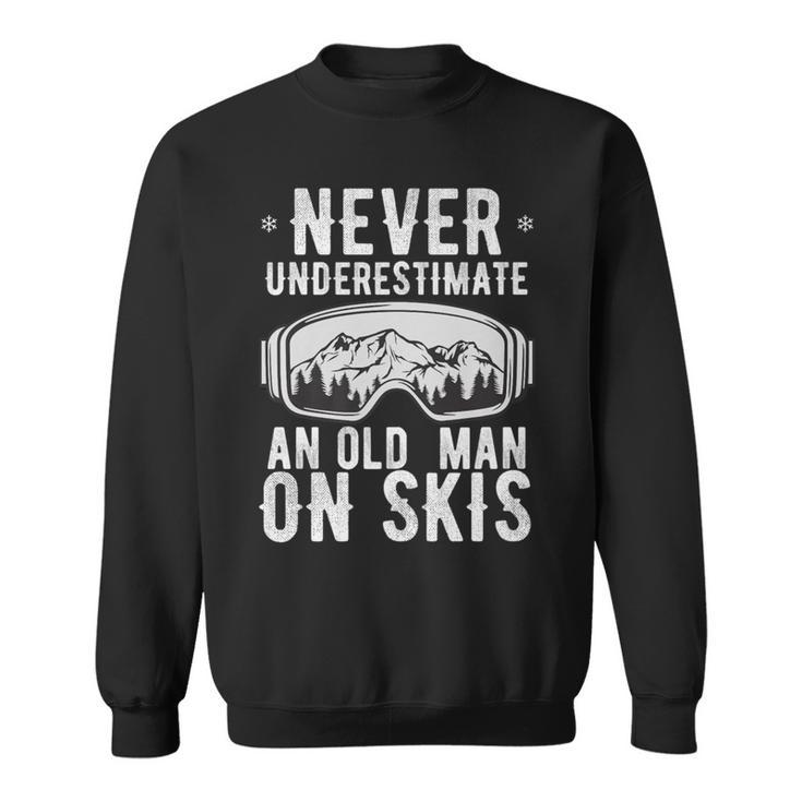 Never Underestimate An Old Man On Skis Winter Holiday Sweatshirt