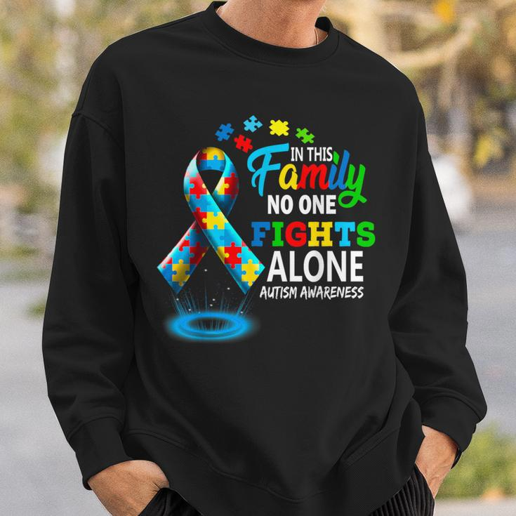 In This Family Nobody Fights Alone Blue Autism Awareness Sweatshirt Gifts for Him