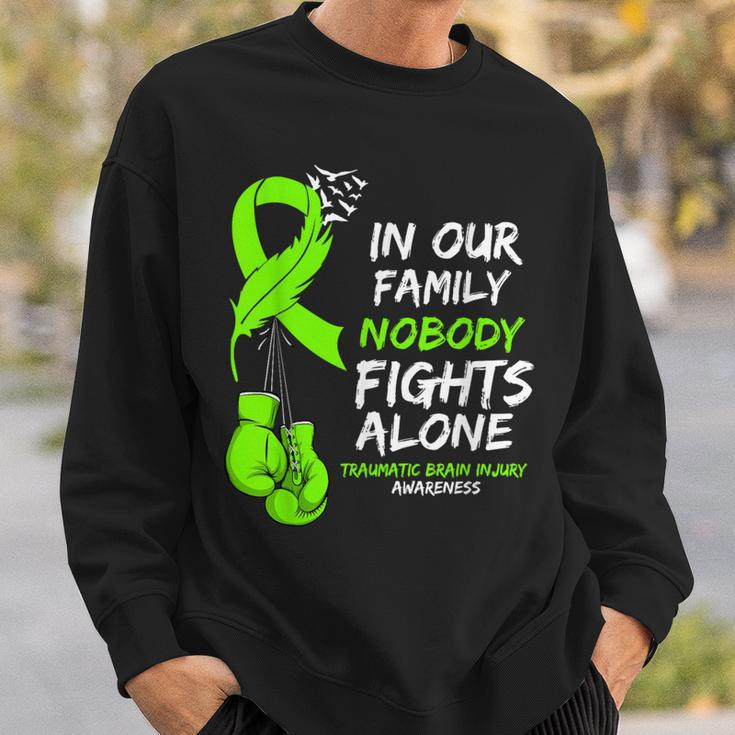 In Our Family Nobody Fights Alone Traumatic Brain Injury Sweatshirt Gifts for Him