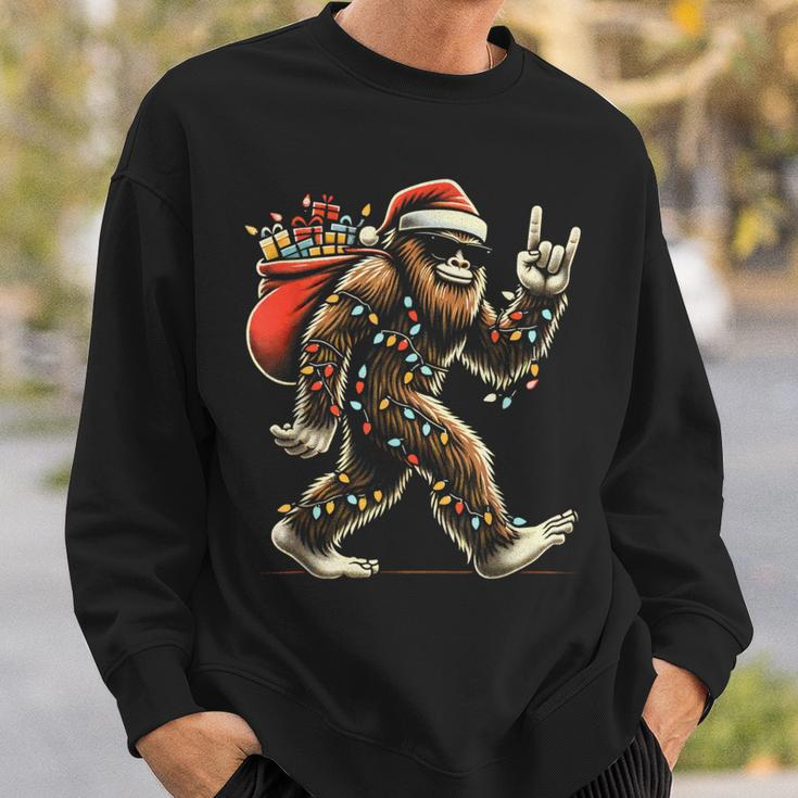 Santa Bigfoot Christmas Lights Sasquatch Believe Sweatshirt Gifts for Him