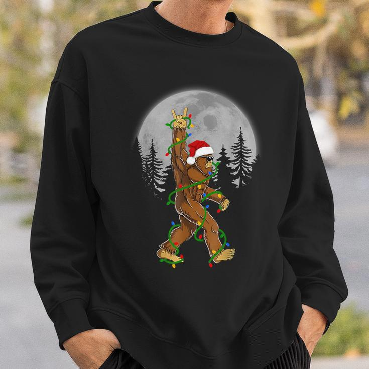 Santa Bigfoot Christmas Sasquatch Rock Roll Believe Pajamas Sweatshirt Gifts for Him