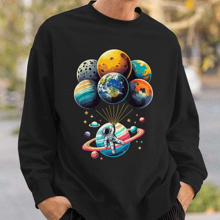 Solar System Astronaut Holding Planet Balloons Space Sweatshirt Gifts for Him