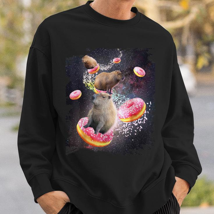 Space Capybara Riding Donut Galaxy Capybaras Sweatshirt Gifts for Him