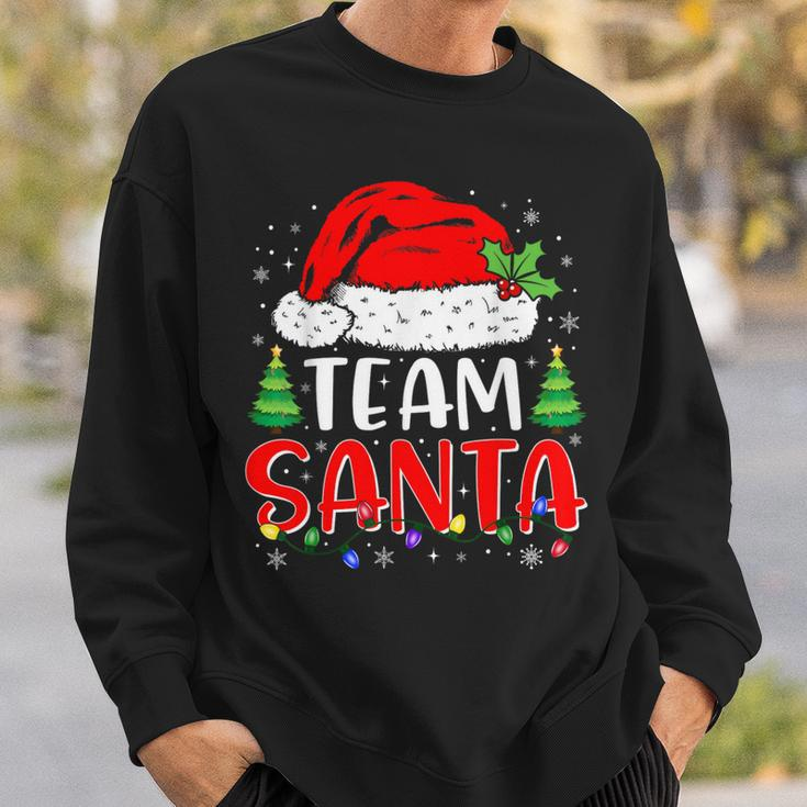 Team Santa Christmas Lights Family Pajamas Matching Sweatshirt Gifts for Him