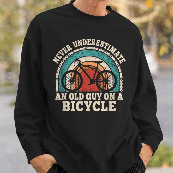 Never Underestimate An Old Guy On A Bicycle Cycling Bike Sweatshirt Gifts for Him