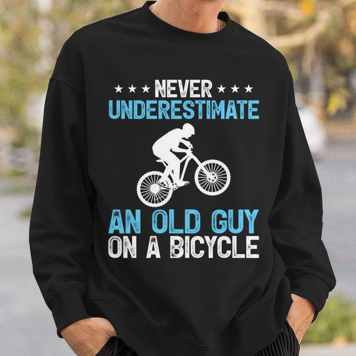 Never Underestimate An Old Guy On A Bicycle Cycling Biker Sweatshirt Gifts for Him