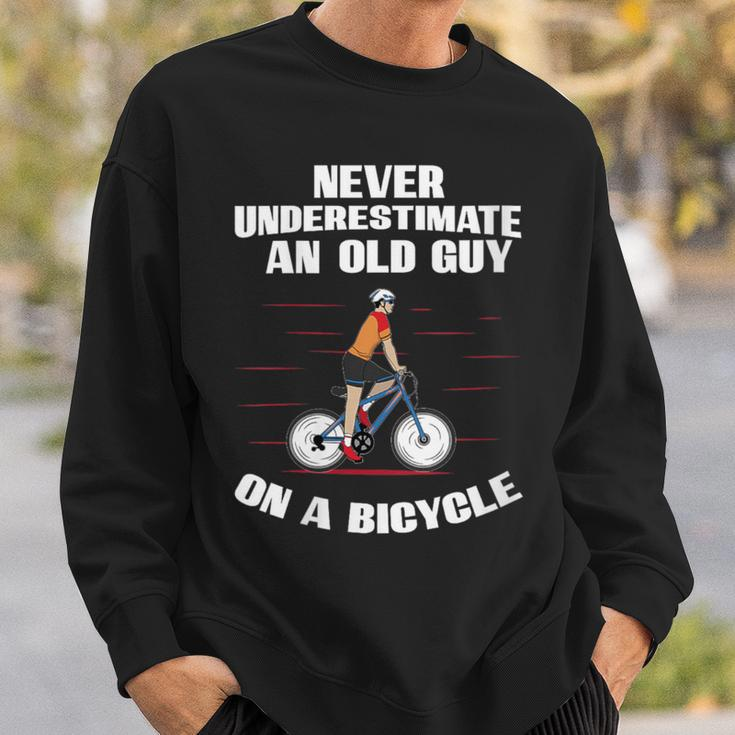 Never Underestimate An Old Guy On A Bicycle Fathers Day Sweatshirt Gifts for Him