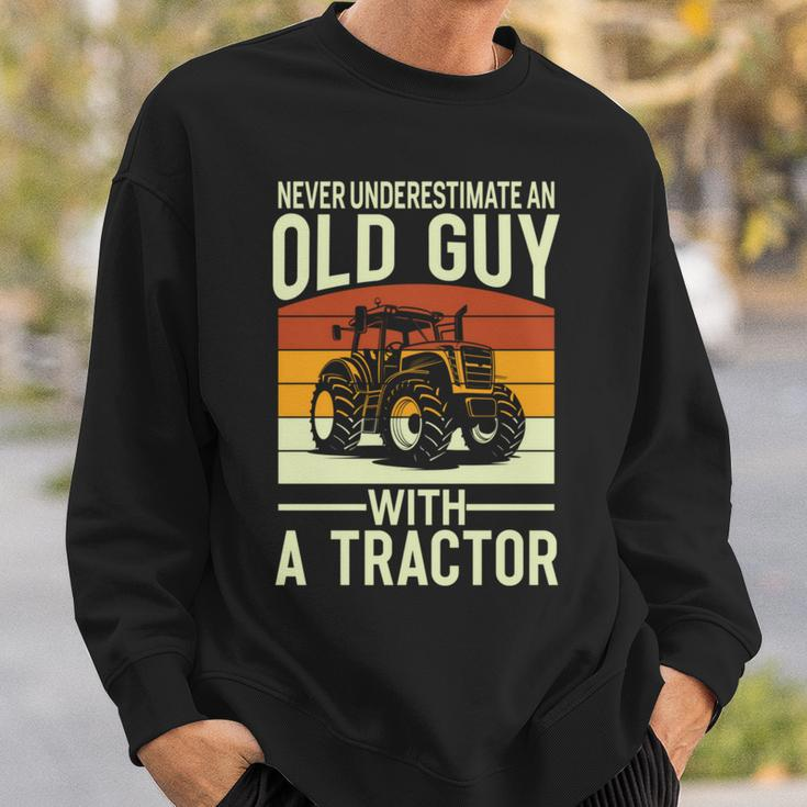 Never Underestimate An Old Guy With A Tractor Farmer Sweatshirt Gifts for Him