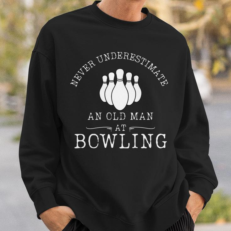 Never Underestimate An Old Man With A Bowling Ball Bowl Sweatshirt Gifts for Him