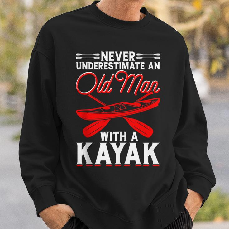 Never Underestimate An Old Man With A Kayak Kayaking Sweatshirt Gifts for Him