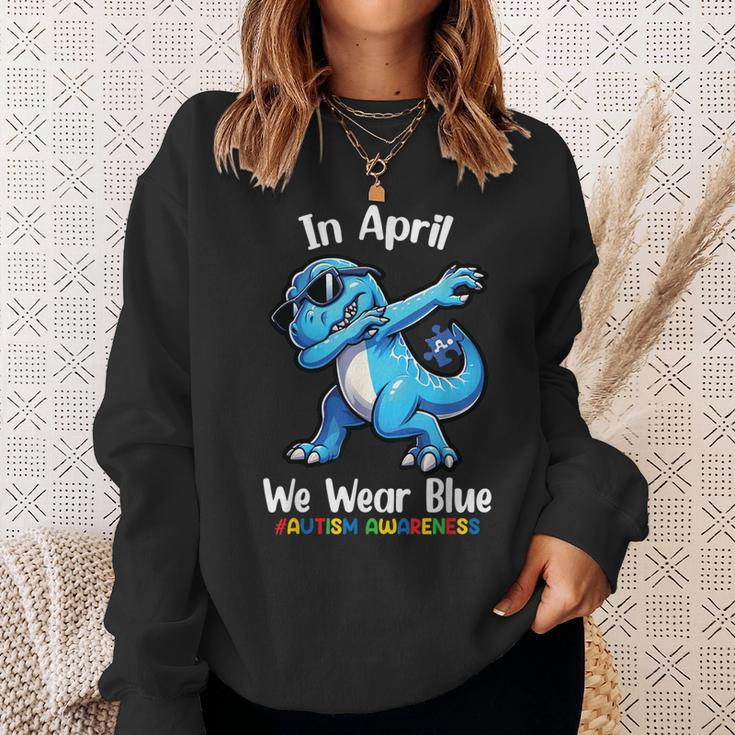 In April We Wear Blue Autism Awareness Month Dinosaur T-Rex Sweatshirt Gifts for Her