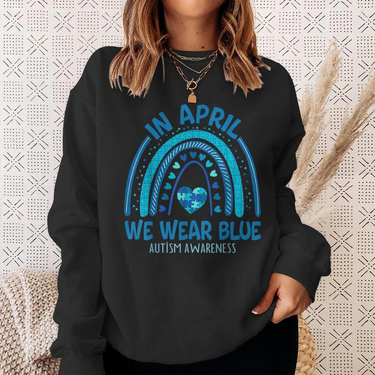 In April We Wear Blue Autism Awareness Puzzle Rainbow Sweatshirt Gifts for Her