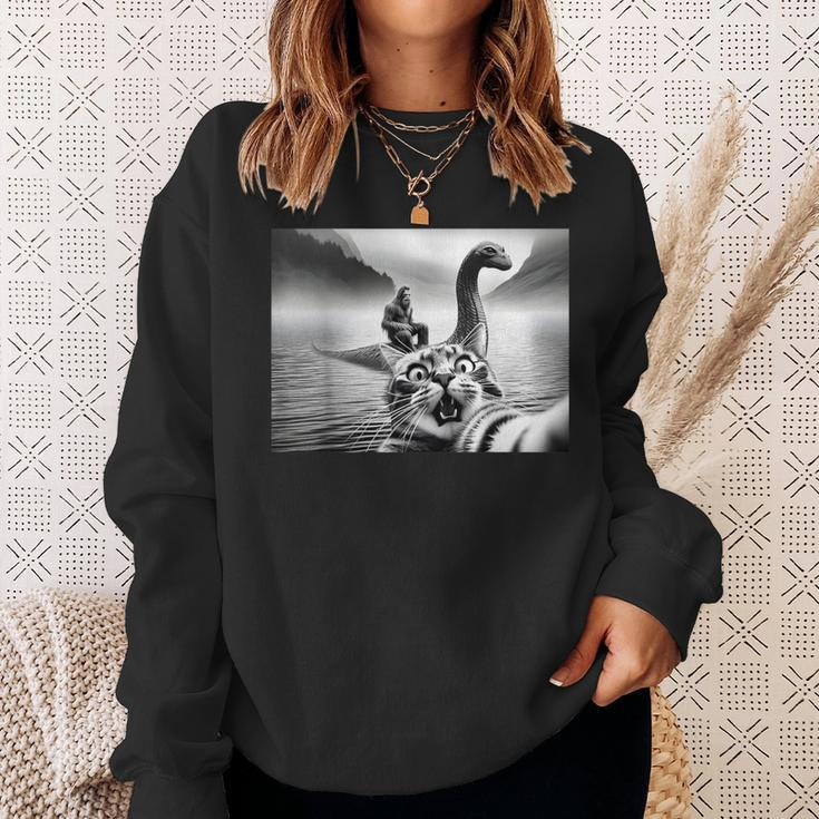 Bigfoot Riding Loch Ness Monster Surprised Scared Cat Selfie Sweatshirt Gifts for Her