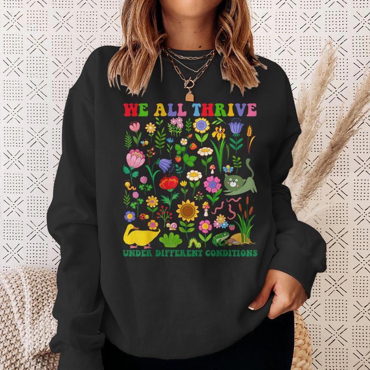 Cute We All Thrive Under Different Conditions Neurodiversity Sweatshirt Gifts for Her