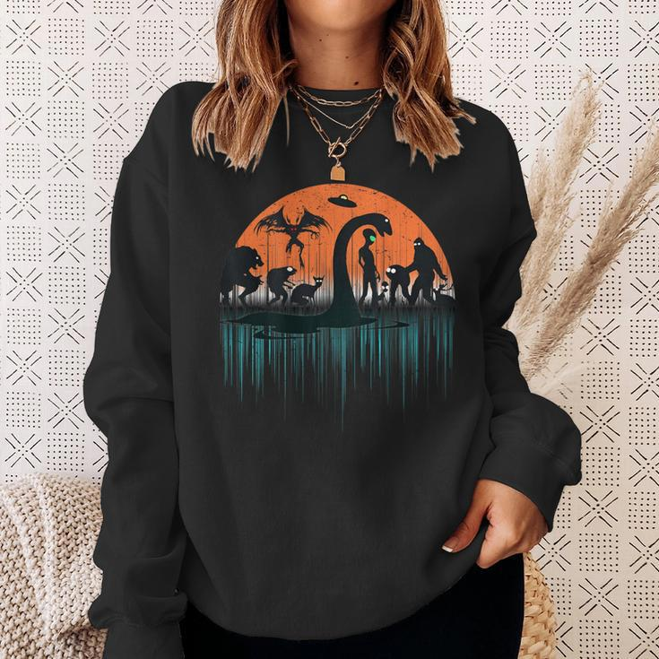 On Back Loch Ness Bigfoot Mothman Alien Cryptid Sweatshirt Gifts for Her