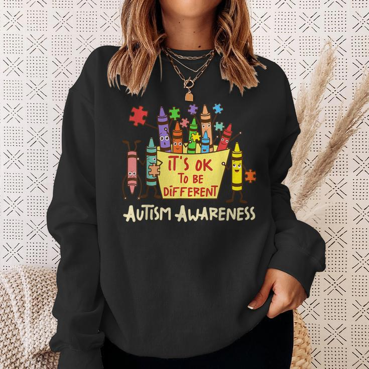 It’S Ok To Be Different Autism Awareness Crayons Teacher Sweatshirt Gifts for Her