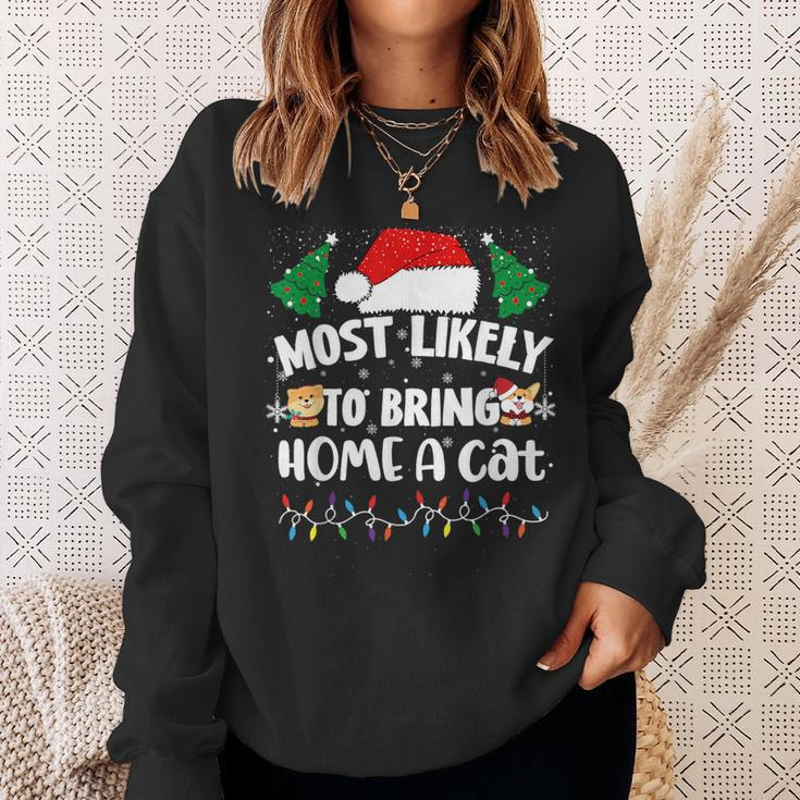 Most Likely To Bring Home A Cat Christmas Family Matching Sweatshirt Gifts for Her