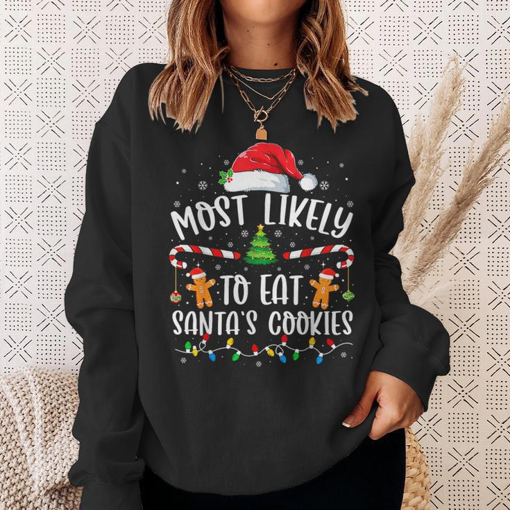 Most Likely To Eat Santas Cookies Xmas Light Sweatshirt Gifts for Her