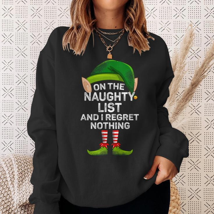 On The Naughty List And I Regret Nothing Elf Christmas Sweatshirt Gifts for Her