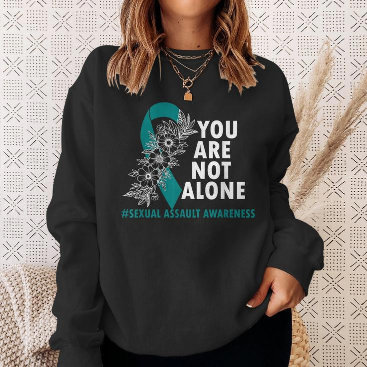 You Are Not Alone Sexual Assault Awareness Month Teal Ribbon Sweatshirt Gifts for Her