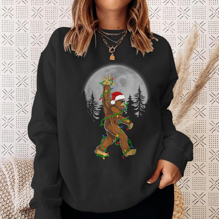 Santa Bigfoot Christmas Sasquatch Rock Roll Believe Pajamas Sweatshirt Gifts for Her