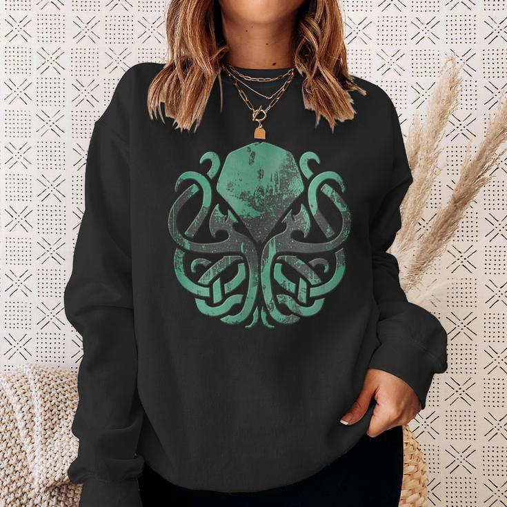 Schwarzes Kraken Sweatshirt mit Vintage-Mond Motiv in Grün Geschenke für Sie