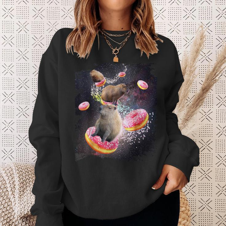 Space Capybara Riding Donut Galaxy Capybaras Sweatshirt Gifts for Her