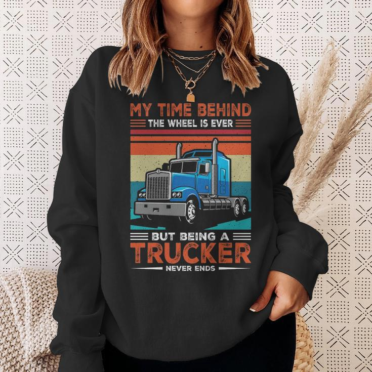 Truck Driver My Time Behind The Wheel Is Ever But Being A Trucker Never Ends Sweatshirt Gifts for Her