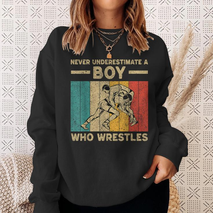 Never Underestimate A Boy Who Wrestles Vintage Wrestling Sweatshirt Gifts for Her