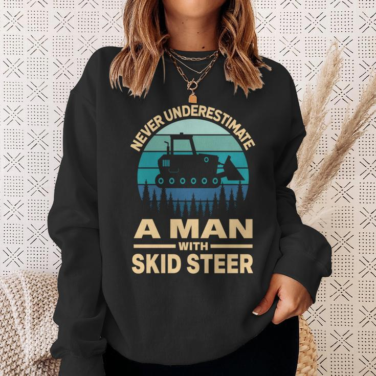 Never Underestimate A Man With A Skid Sr Construction Sweatshirt Gifts for Her