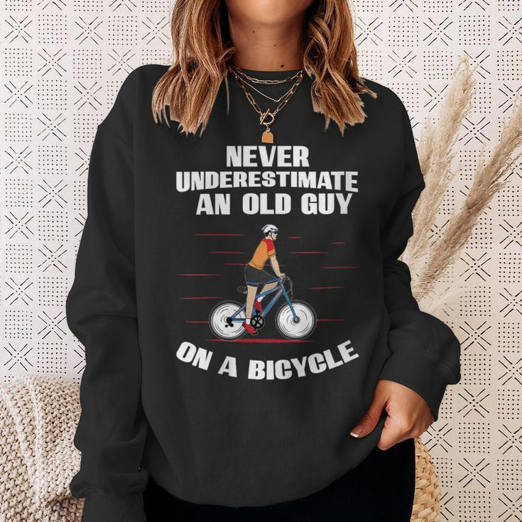 Never Underestimate An Old Guy On A Bicycle Fathers Day Sweatshirt Gifts for Her