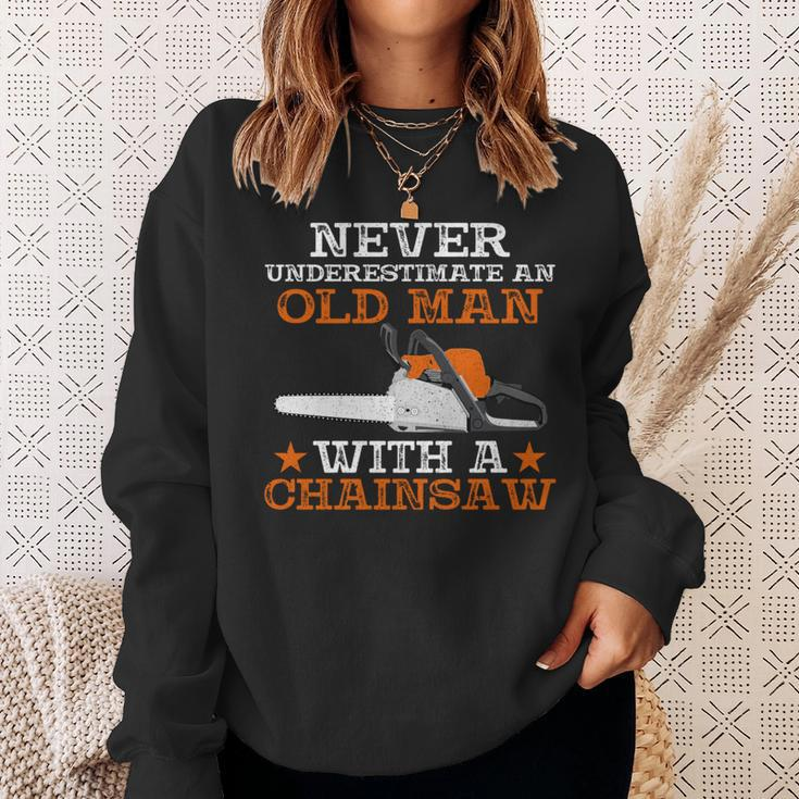 Never Underestimate An Old Man With Chainsaw Lumberjack Wood Sweatshirt Gifts for Her